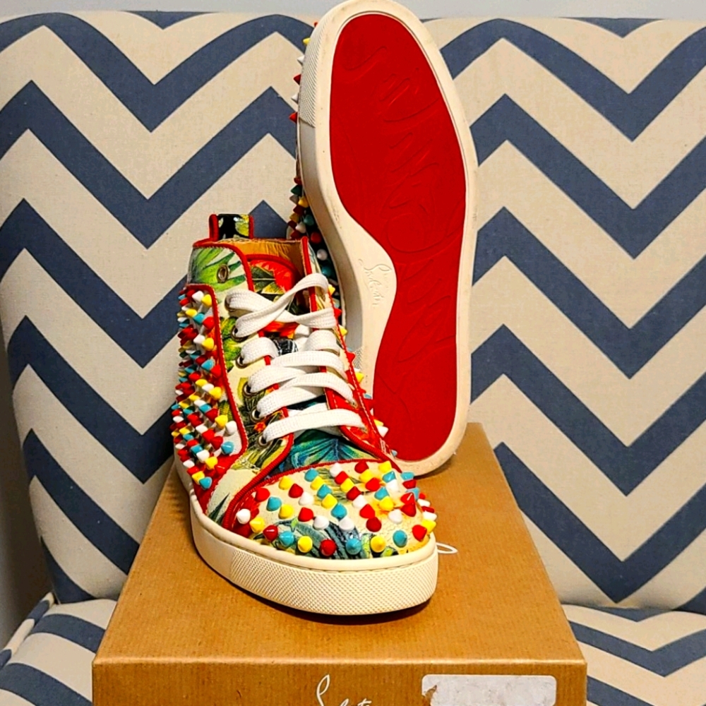 Christian Louboutin women sneakers with spikes.
